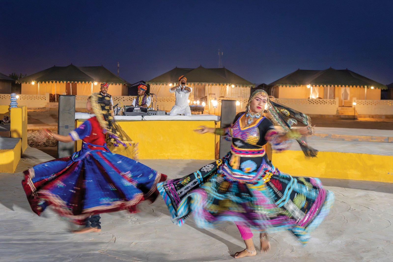 Rajasthani folk dancers performing a cultural evening at Dangri Desert Camp